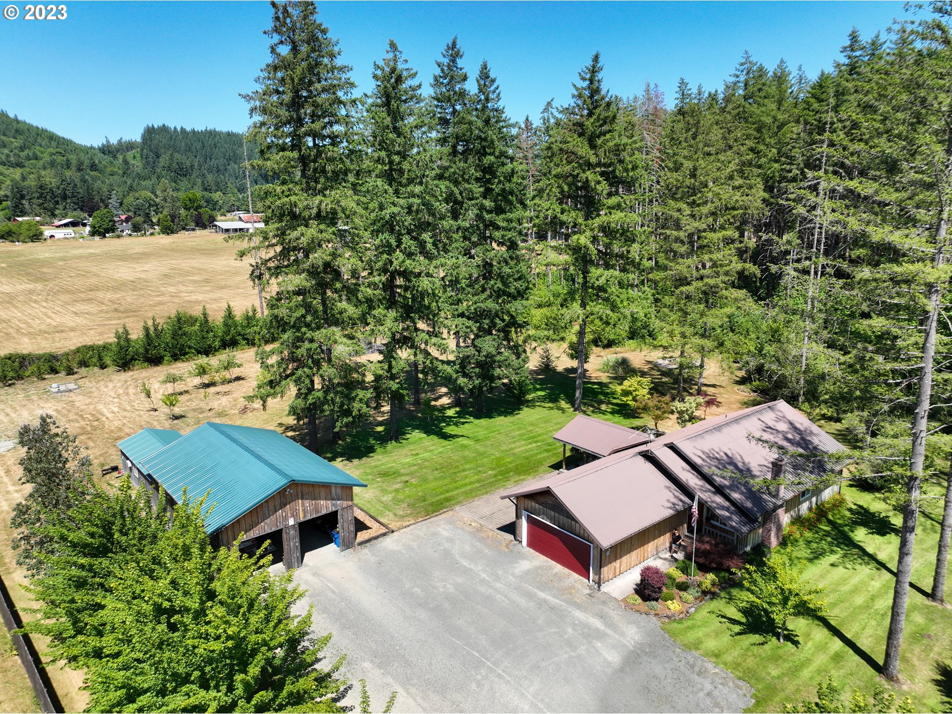 30400 Northeast Healy Road Amboy, WA 98601 - Photo 2 of 48 an aerial view of a house with garden space and street view