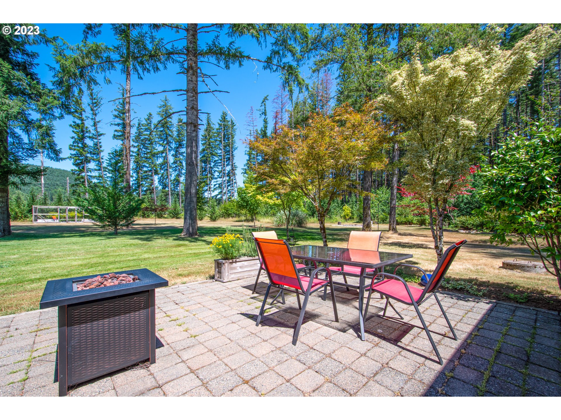 30400 Northeast Healy Road Amboy, WA 98601 - Photo 22 of 48 a view of a backyard with sitting area