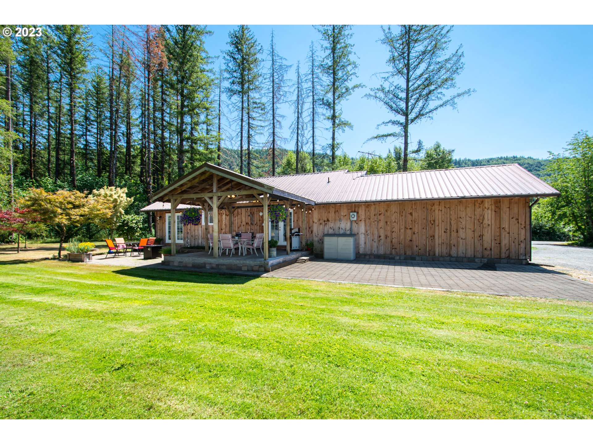30400 Northeast Healy Road Amboy, WA 98601 - Photo 24 of 48 a house with swimming pool in front of it
