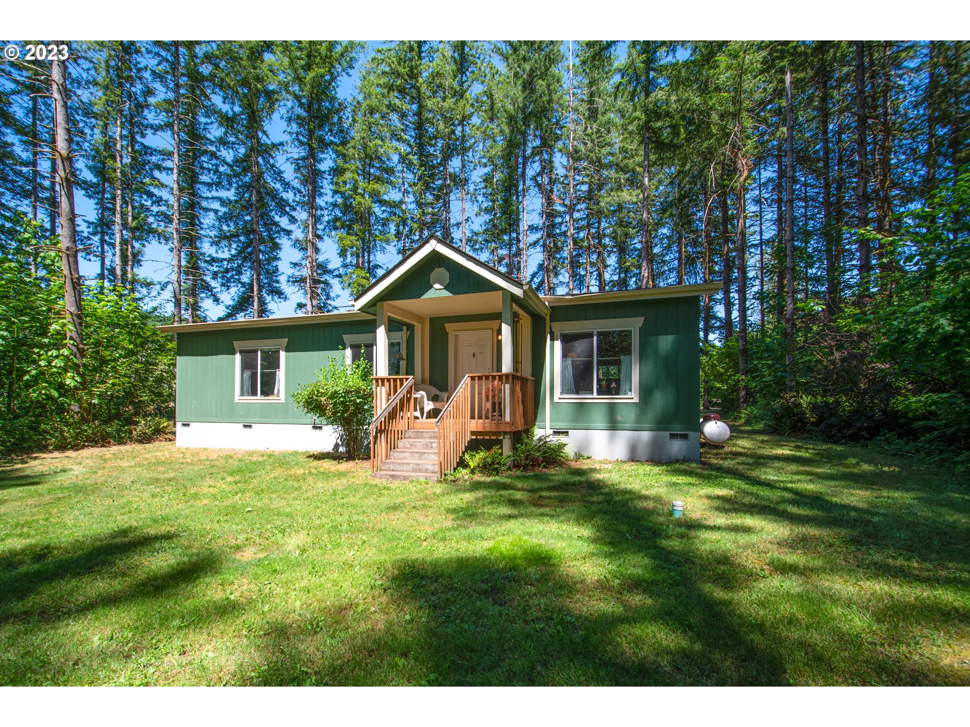 30400 Northeast Healy Road Amboy, WA 98601 - Photo 38 of 48 a front view of a house with a yard