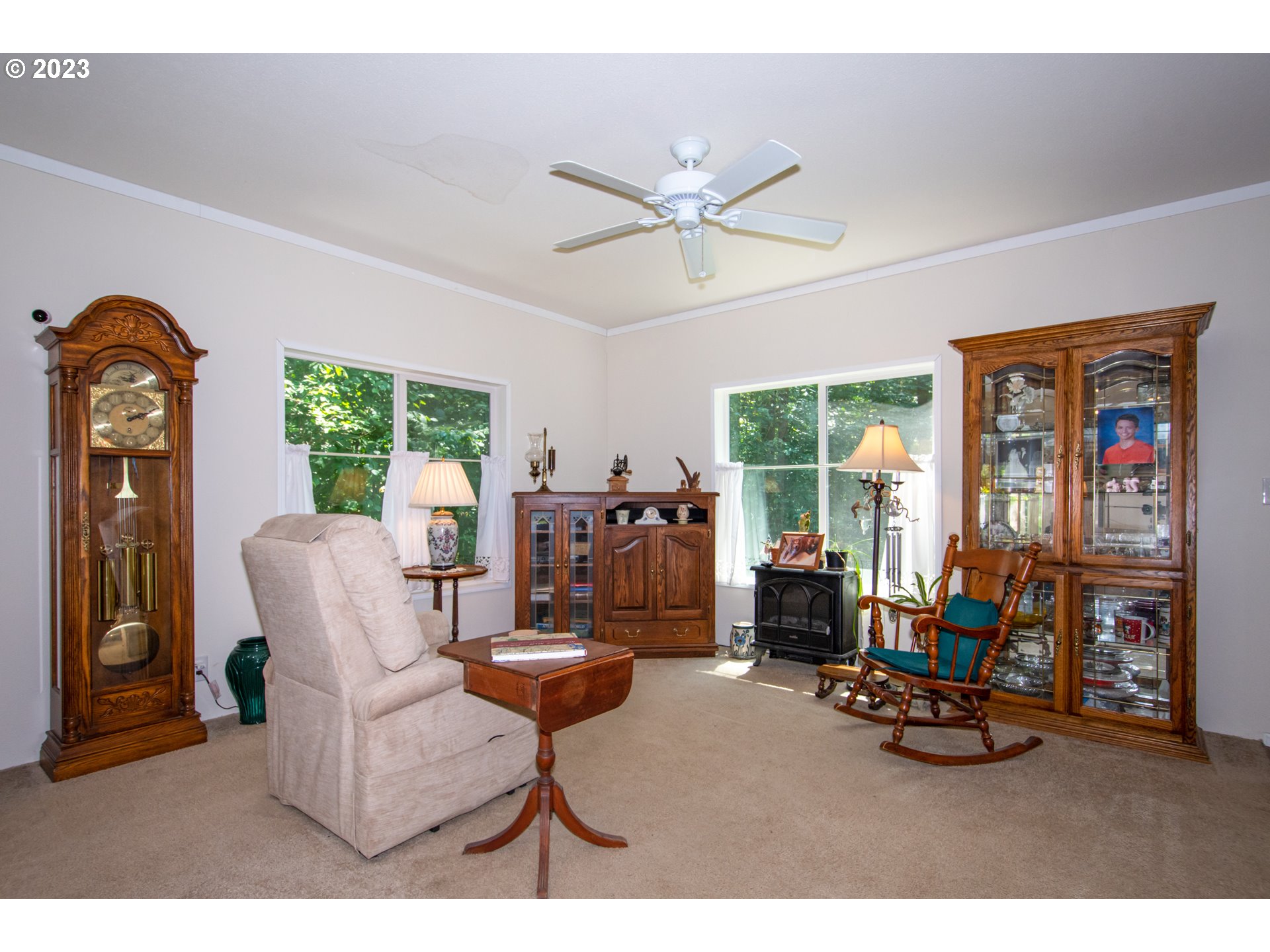 30400 Northeast Healy Road Amboy, WA 98601 - Photo 40 of 48 a living room with furniture and a flat screen tv