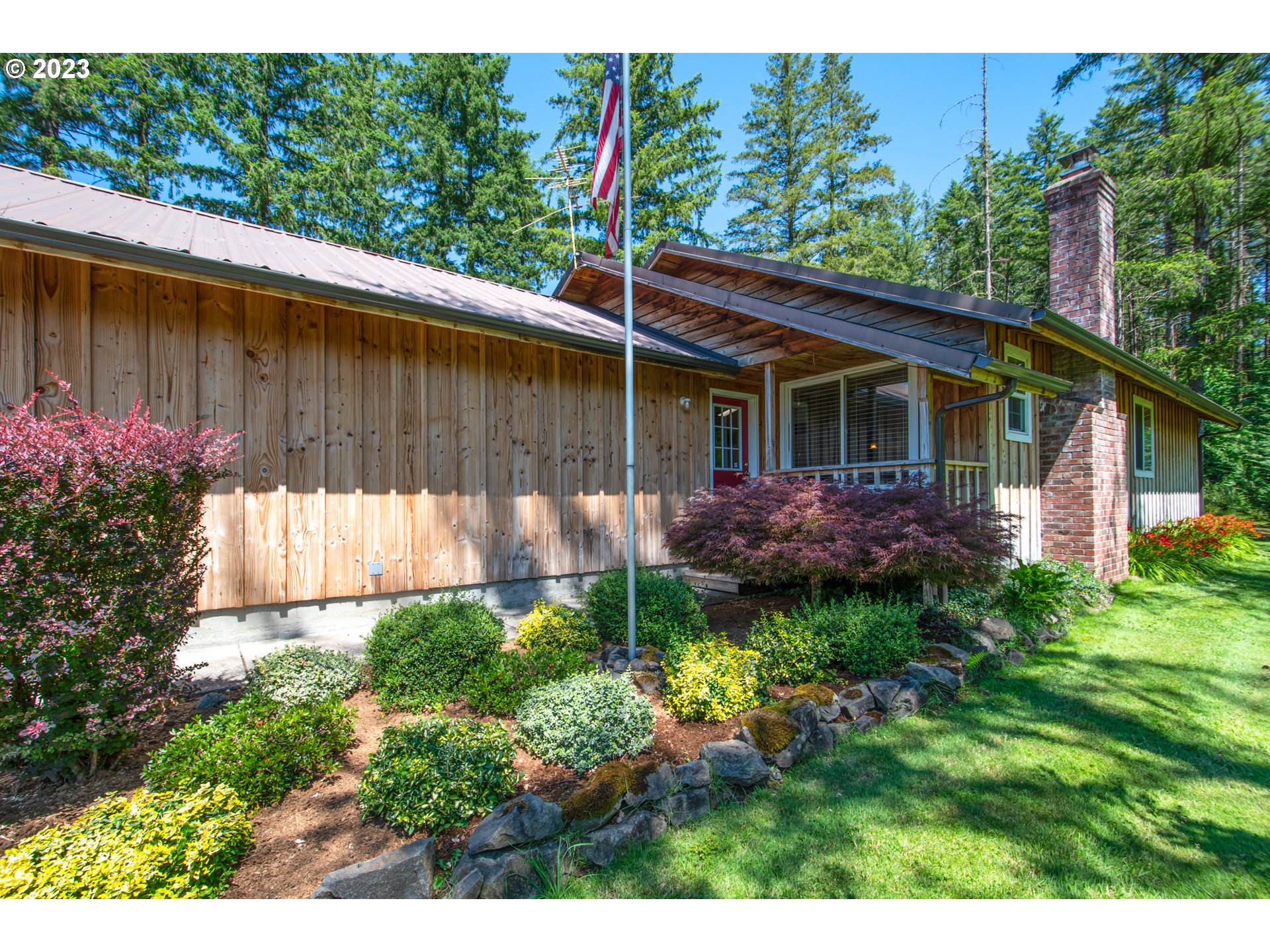 30400 Northeast Healy Road Amboy, WA 98601 - Photo 4 of 48 a view of a backyard with a garden