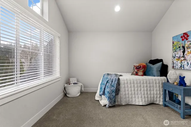 an aerial view of a house with a garden and plants