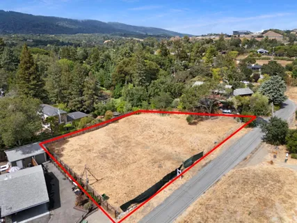 an aerial view of residential house and lake view