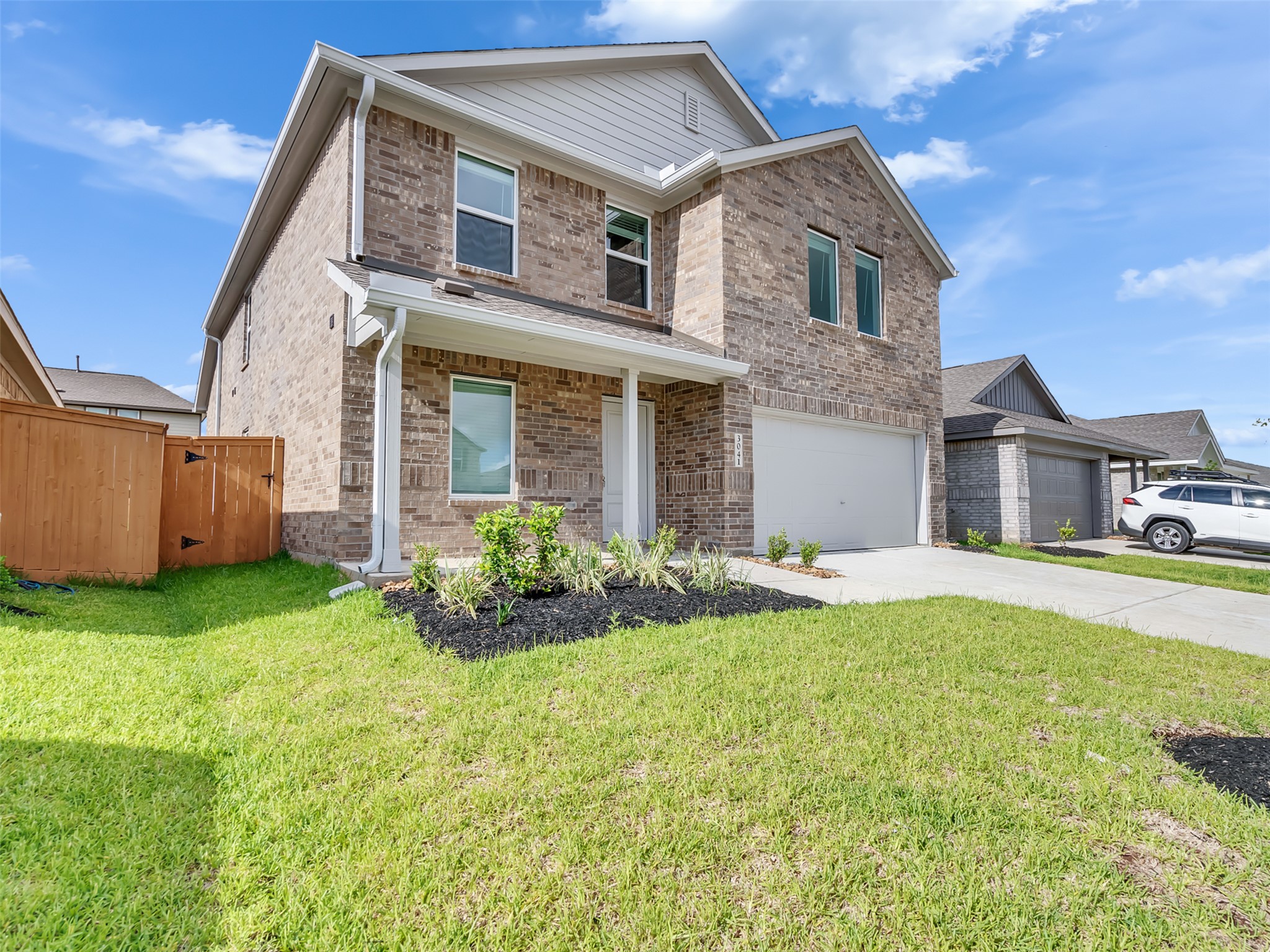3041 Colusa Rdg Drive Katy, TX 77493 - Photo 24 of 26 a front view of house with yard and garage