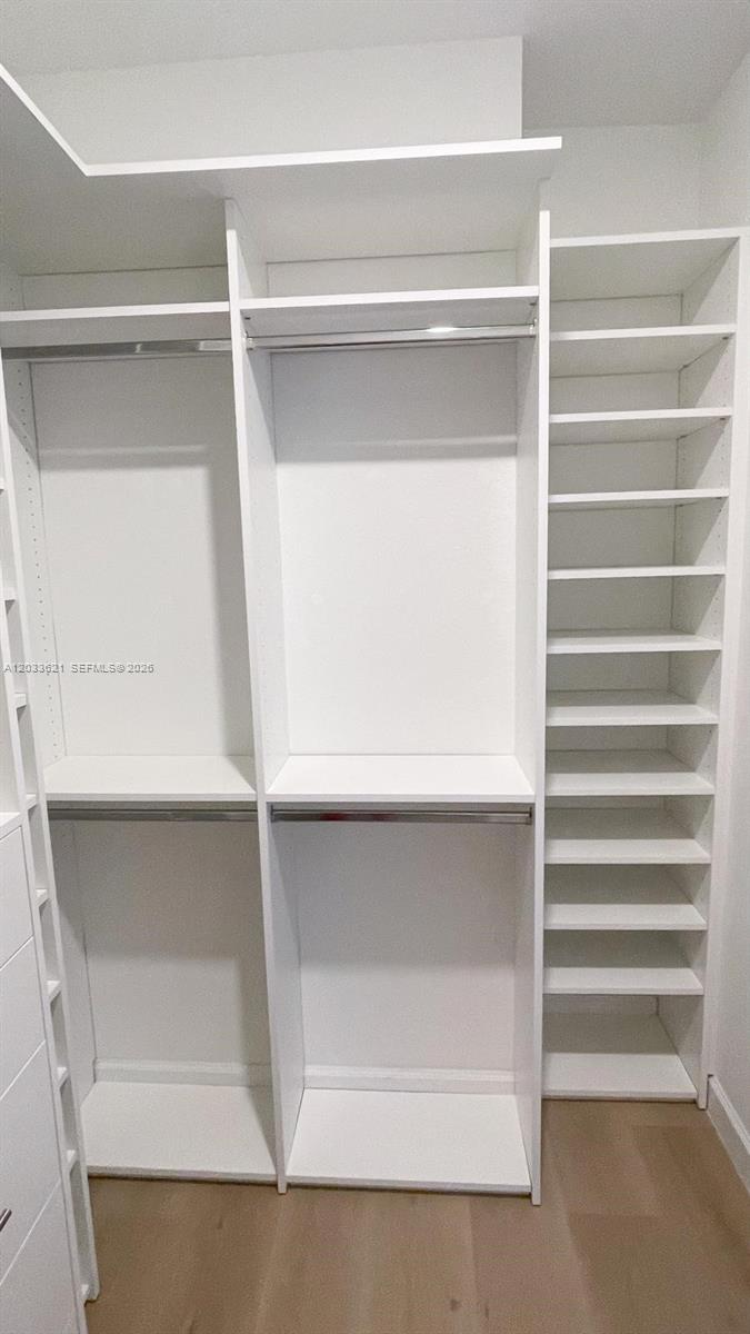 11942 Southwest 243rd Street Homestead, FL 33032 - Photo 22 of 50 a view of an empty walk in closet