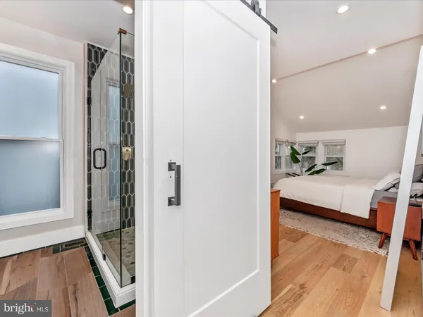 a view of a bathroom from the hallway