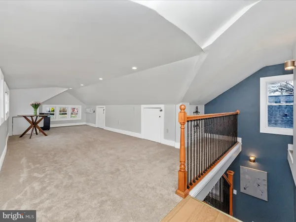 a view of a hallway with workspace