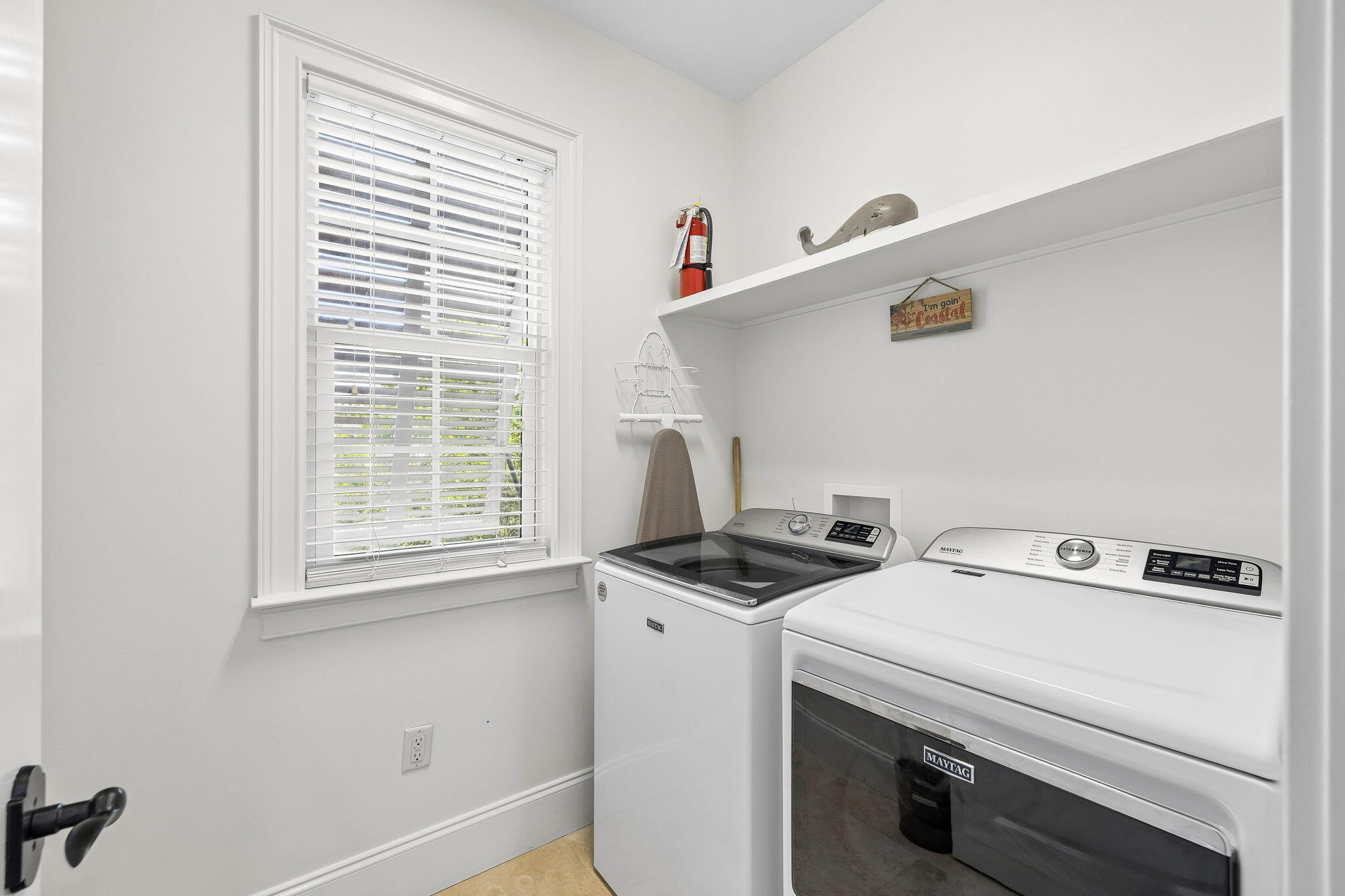 1973 Baytowne Loop Miramar Beach, FL 32550 - Photo 17 of 38 a utility room with dryer and washer