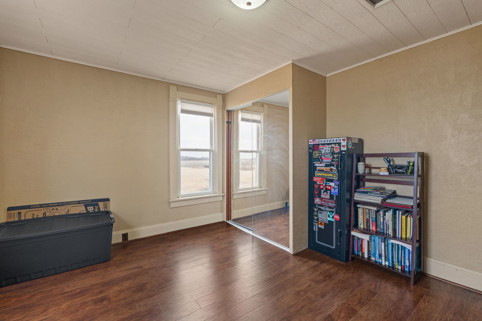 12596 East 200th Street Orion, IL 61273 - Photo 11 of 27 a view of a room with wooden floor and bookshelf