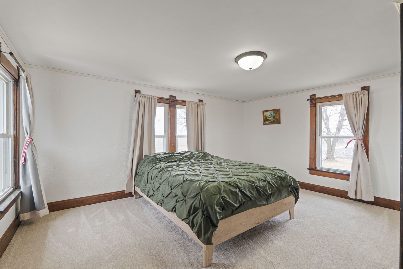 12596 East 200th Street Orion, IL 61273 - Photo 16 of 27 a bedroom with a bed and a window
