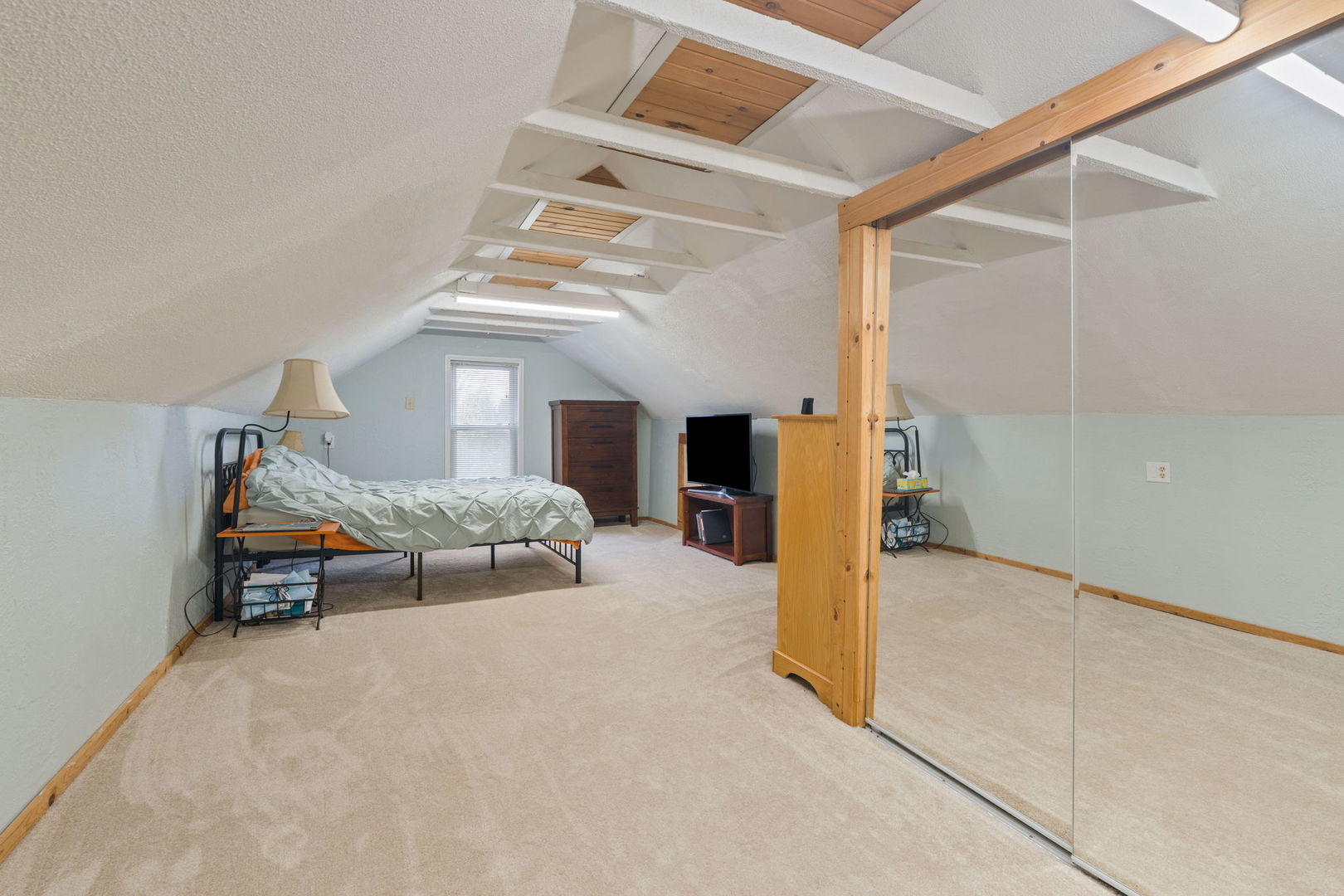 12596 East 200th Street Orion, IL 61273 - Photo 17 of 27 a bedroom with furniture and a window