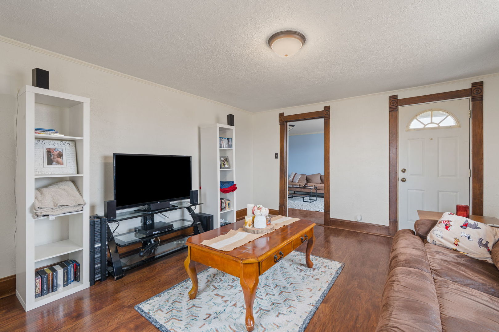 12596 East 200th Street Orion, IL 61273 - Photo 4 of 27 a living room with furniture and a flat screen tv