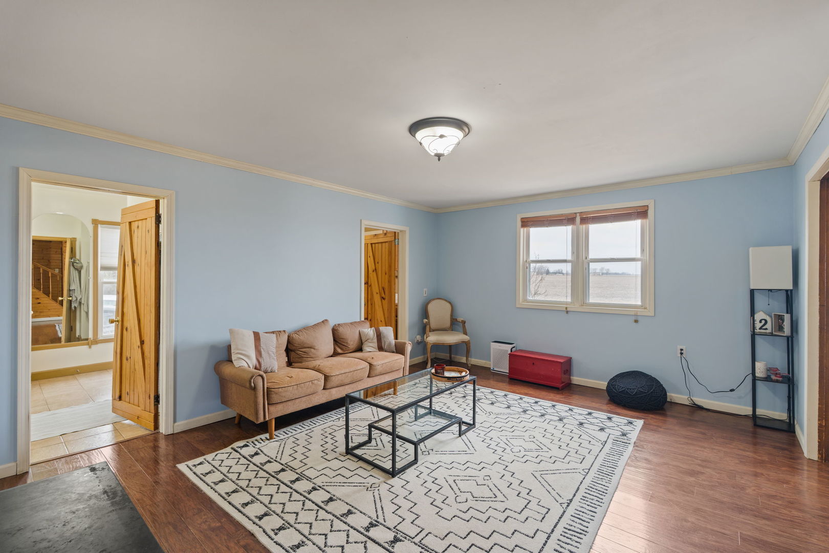 12596 East 200th Street Orion, IL 61273 - Photo 5 of 27 a living room with furniture and wooden floor