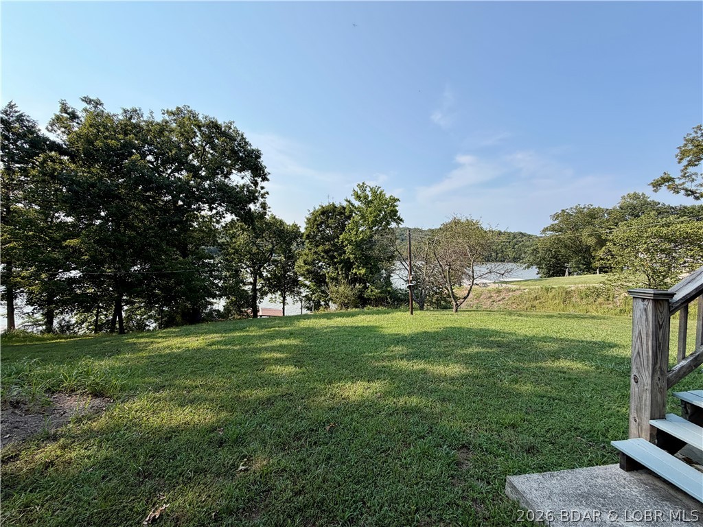 1368 Cedar Ridge Circle Roach, MO 65787 - Photo 34 of 42 back yard/ lakeside