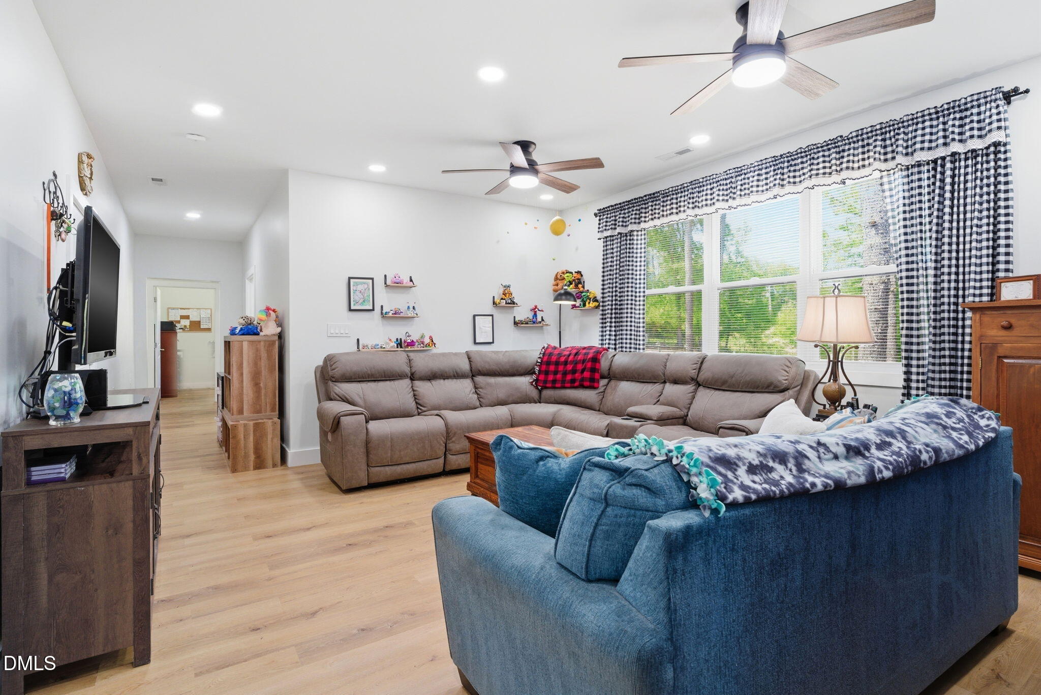 5416 Pulley Town Road Zebulon, NC 27597 - Photo 58 of 74 a living room with furniture and a large window
