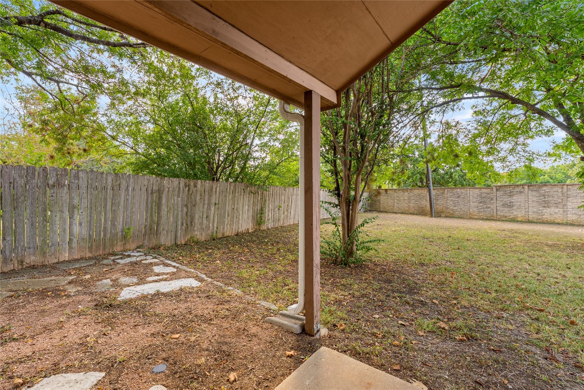 14433 Robert I Walker Boulevard Austin, TX 78728 - Photo 14 of 15 Fenced backyard featuring a patio
