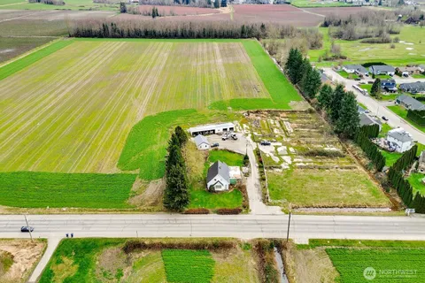 a view of a swimming pool with an outdoor space and seating area