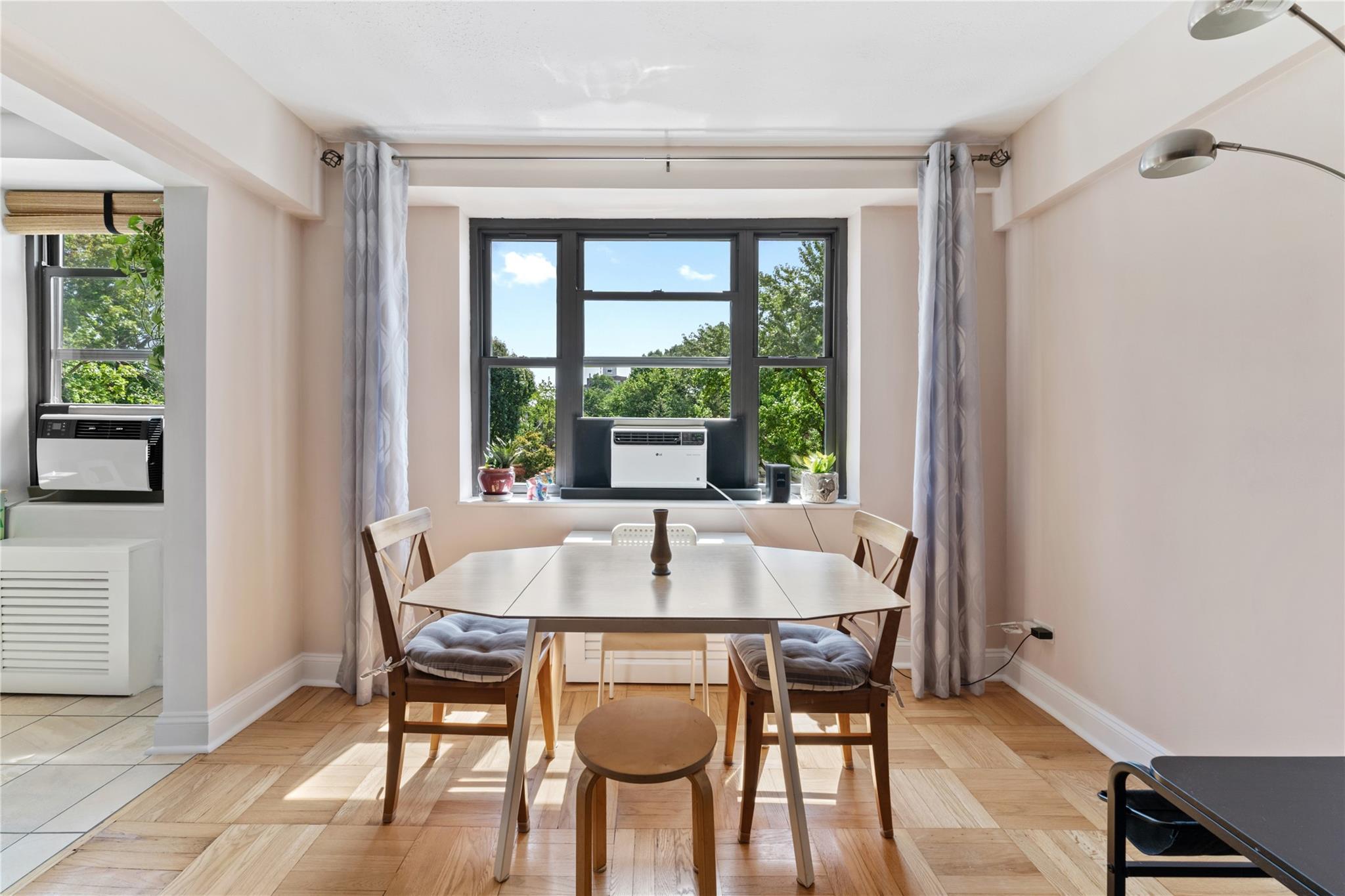 3103 Fairfield Avenue, Unit 5D Bronx, NY 10463 - Photo 3 of 13 a dining room with furniture and window