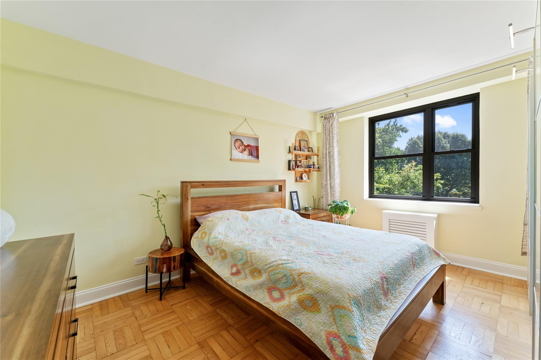 3103 Fairfield Avenue, Unit 5D Bronx, NY 10463 - Photo 6 of 13 a bedroom with a bed and a window