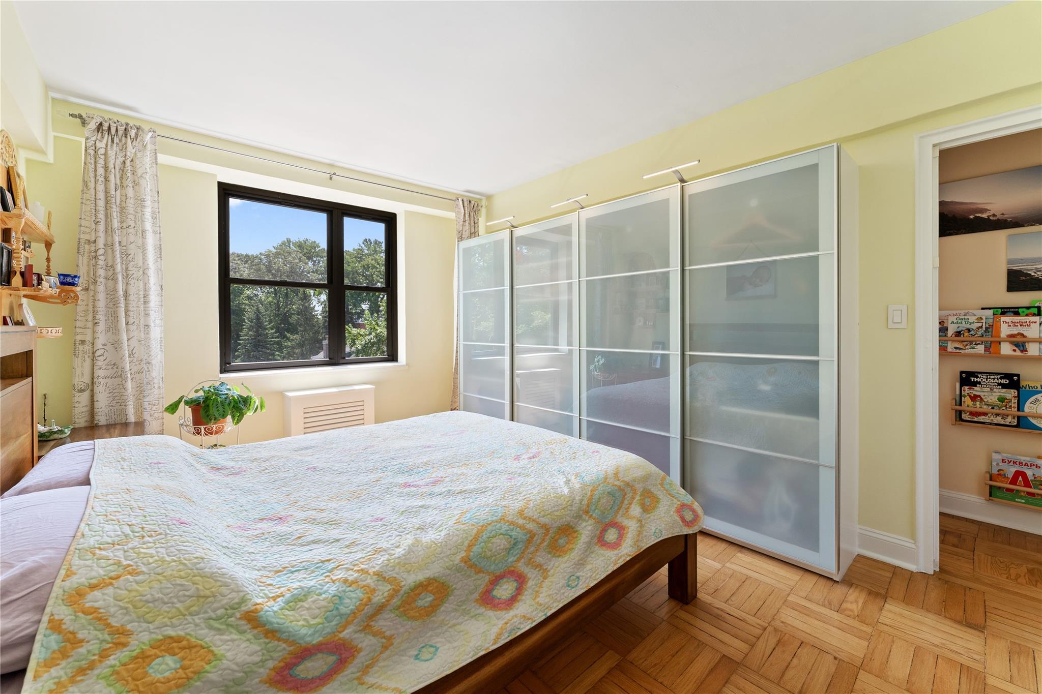 3103 Fairfield Avenue, Unit 5D Bronx, NY 10463 - Photo 7 of 13 a bedroom with a bed and a window