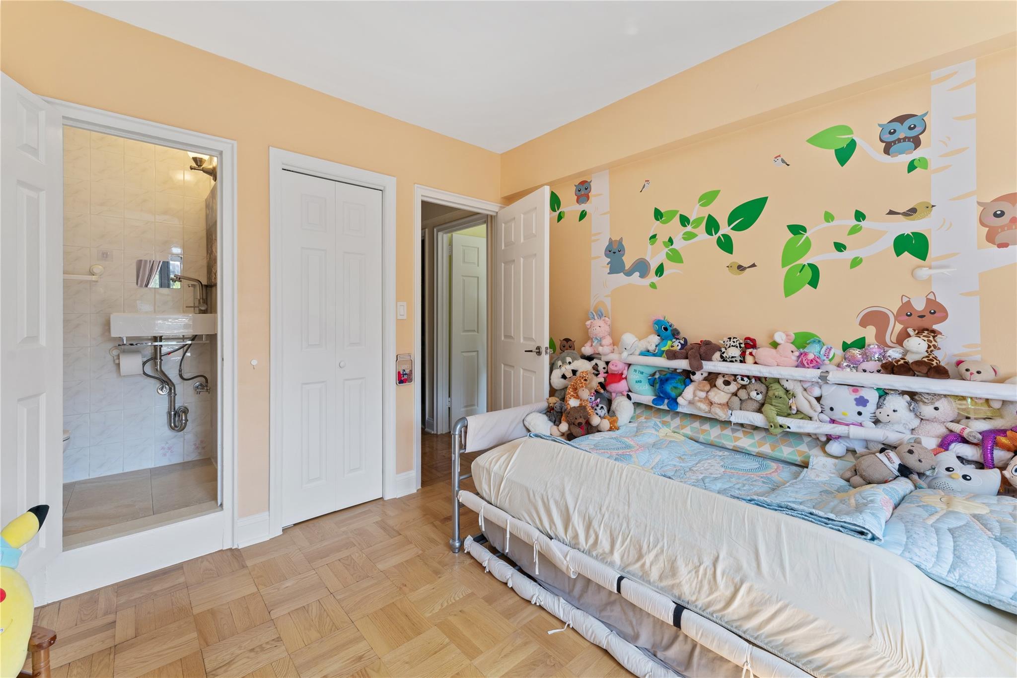 3103 Fairfield Avenue, Unit 5D Bronx, NY 10463 - Photo 10 of 13 a bedroom with a bed and a painting on the wall