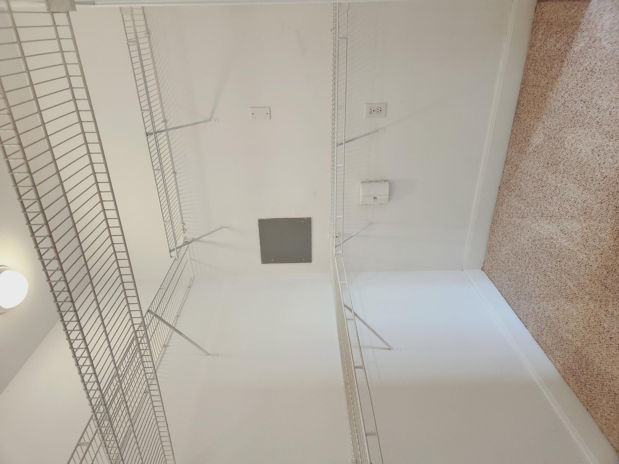 7701 Rialto Boulevard, Unit 833 Austin, TX 78735 - Photo 18 of 24 a view of a room with racks on the wall