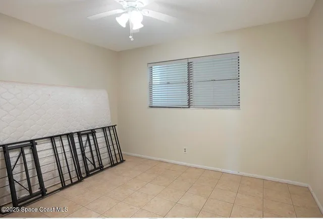 a view of balcony with floor to ceiling with ocean view
