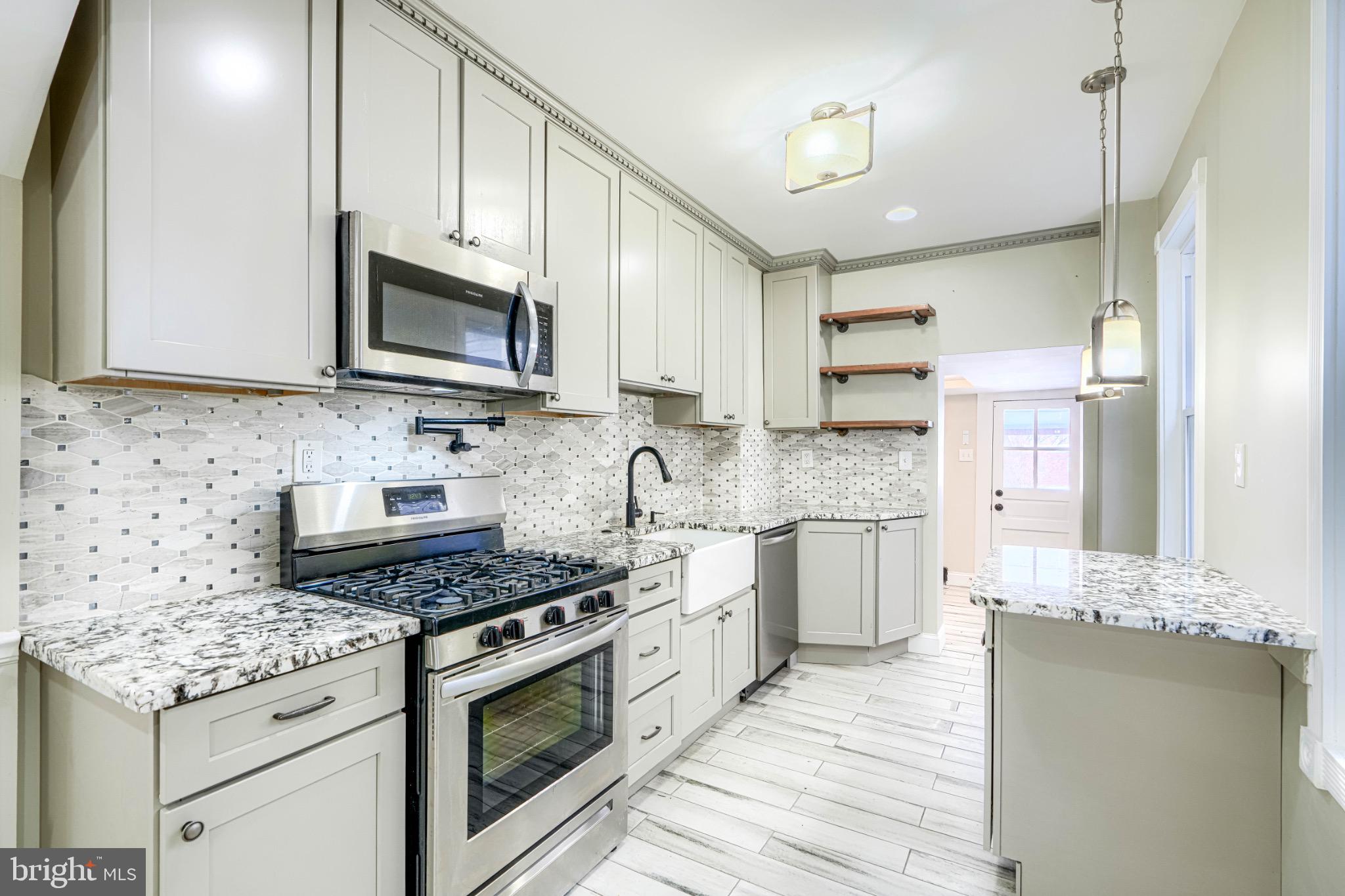 3533 Keswick Road Baltimore, MD 21211 - Photo 11 of 29 Modern kitchen with sleek finishes.