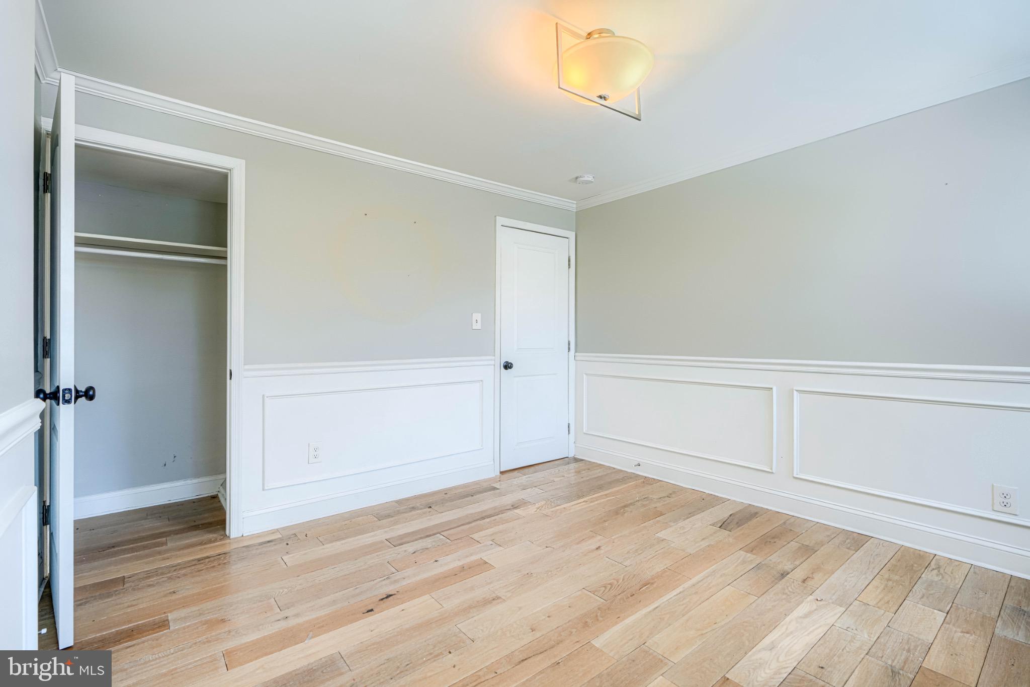 3533 Keswick Road Baltimore, MD 21211 - Photo 17 of 29 Bright, airy room with elegant wainscoting.