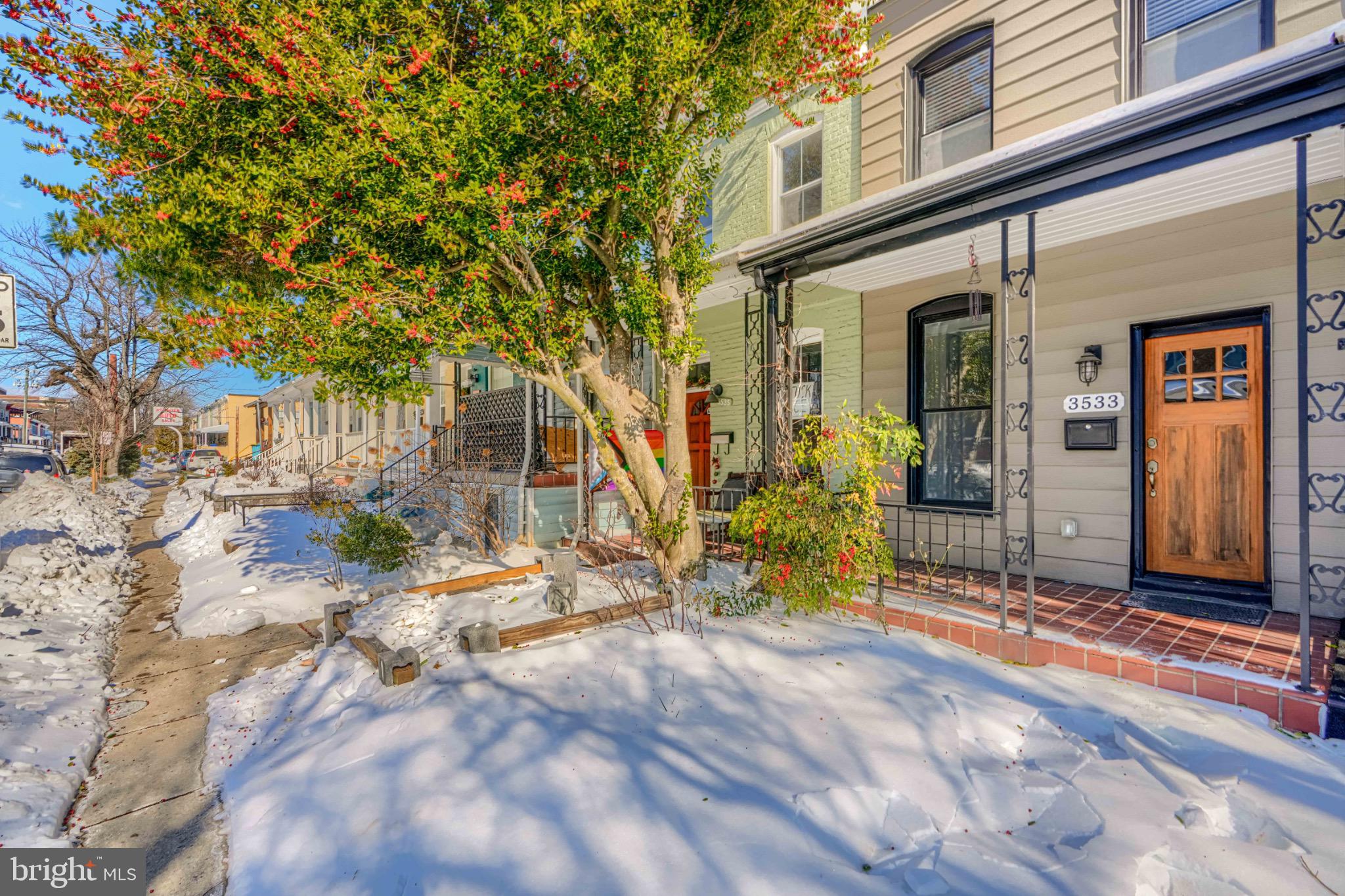 3533 Keswick Road Baltimore, MD 21211 - Photo 2 of 29 Charming home nestled in a snowy landscape.