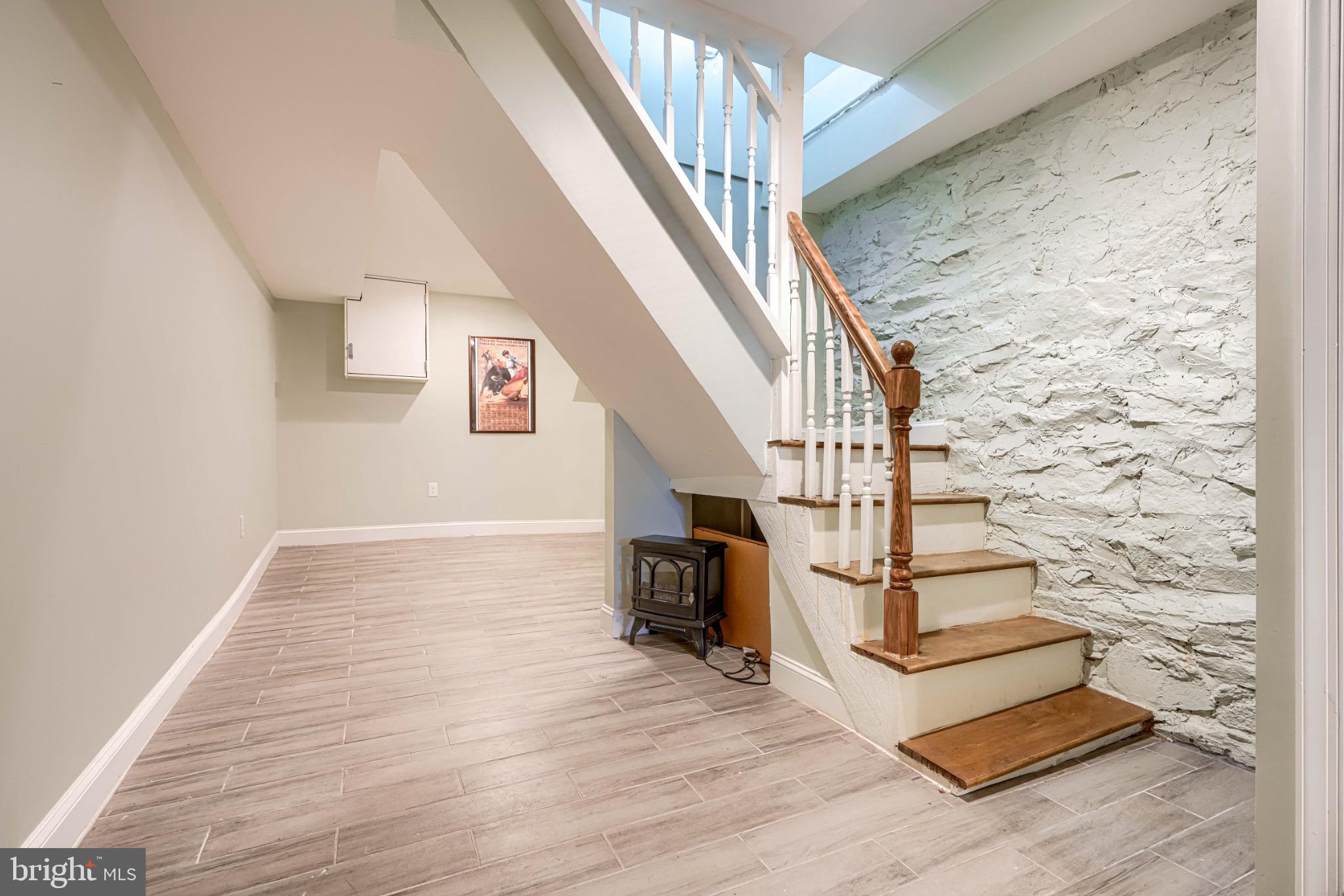 3533 Keswick Road Baltimore, MD 21211 - Photo 23 of 29 Inviting entryway with charming stone accents.