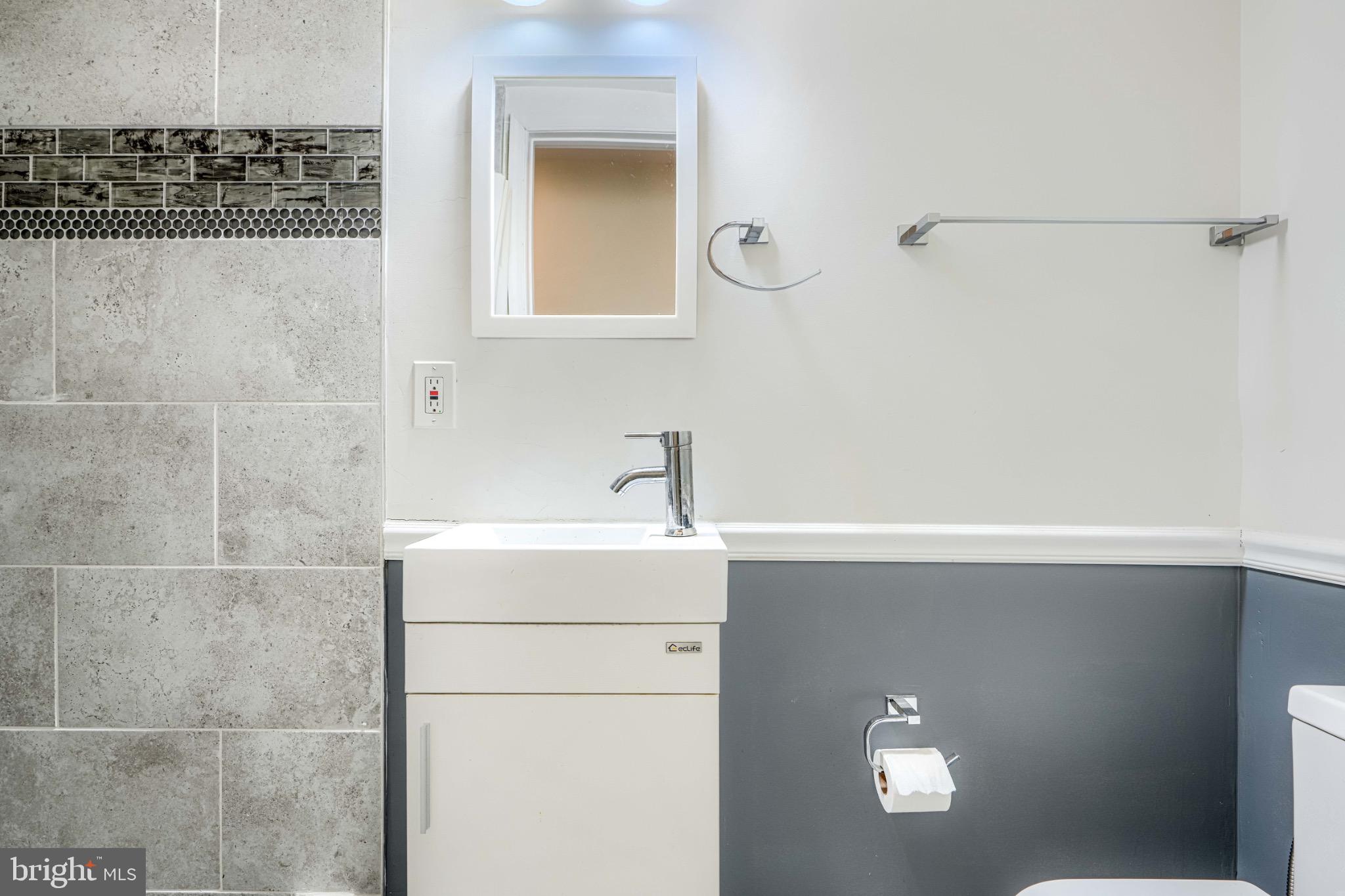 3533 Keswick Road Baltimore, MD 21211 - Photo 25 of 29 Sleek modern bathroom with stylish finishes.