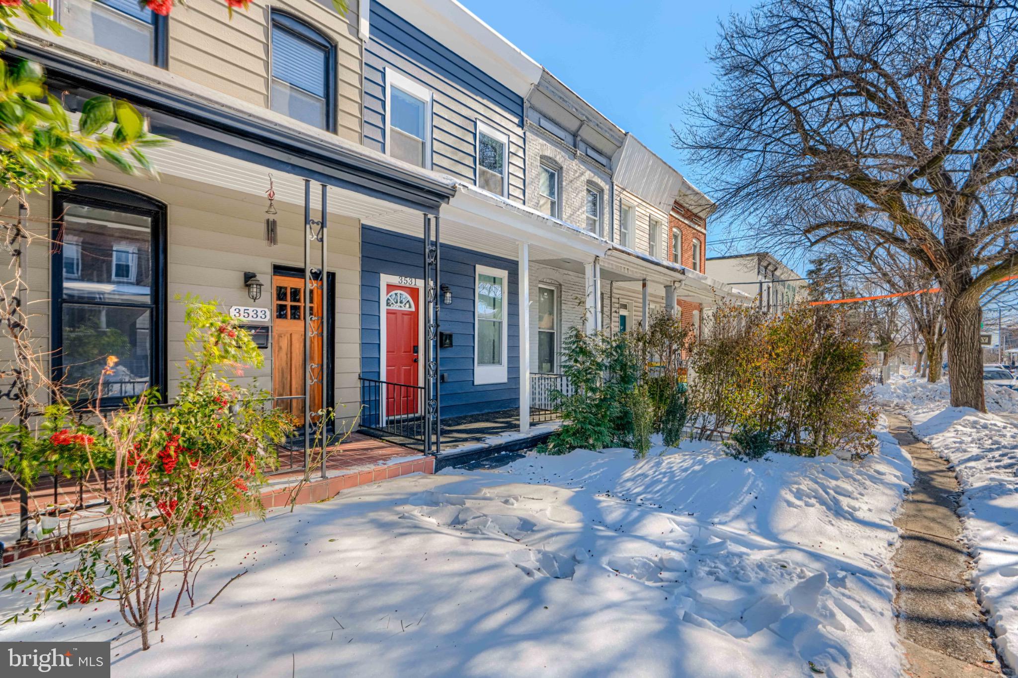 3533 Keswick Road Baltimore, MD 21211 - Photo 3 of 29 Charming homes nestled in a snowy landscape.