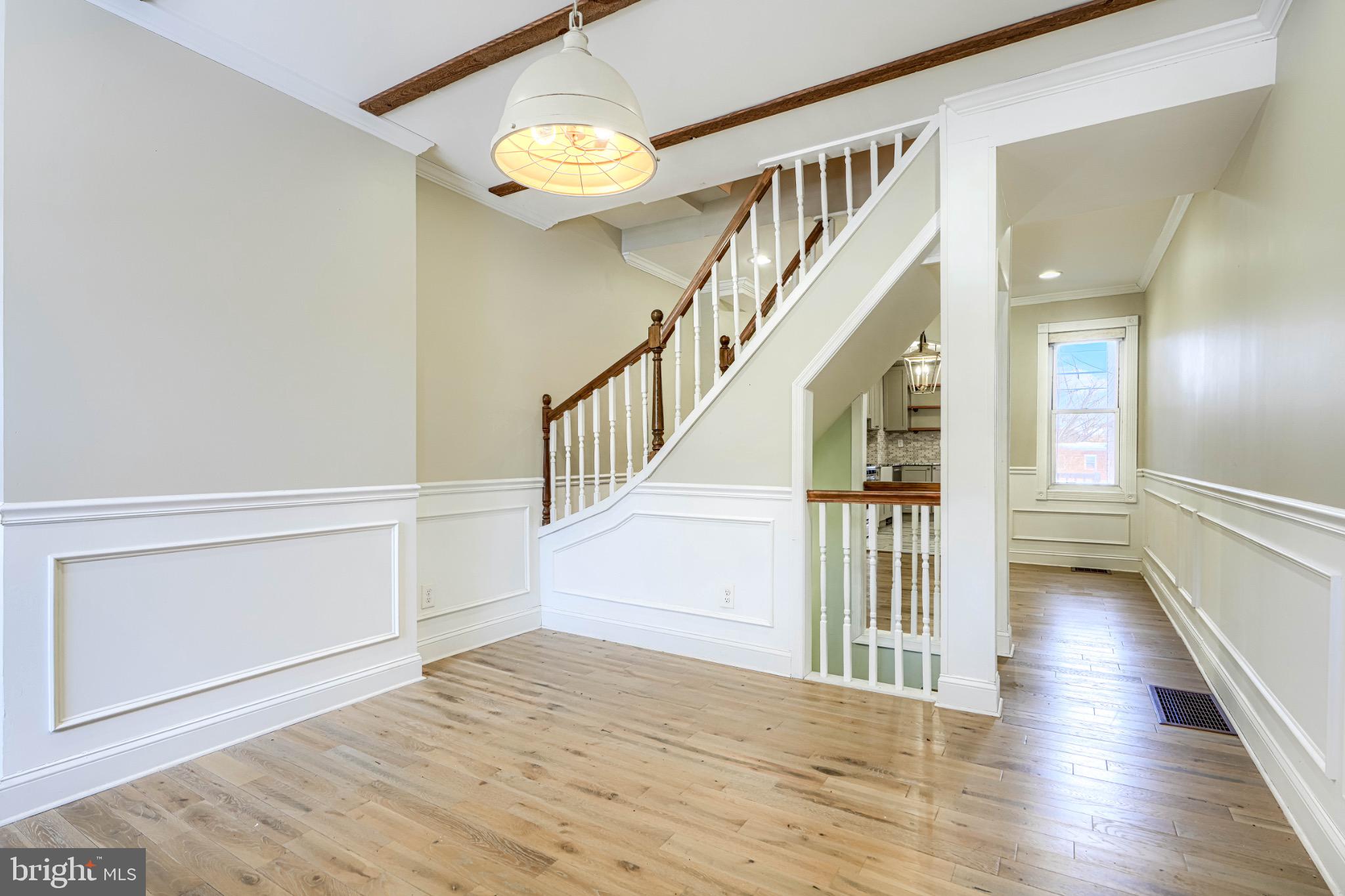 3533 Keswick Road Baltimore, MD 21211 - Photo 6 of 29 Elegant foyer with classic architectural details.
