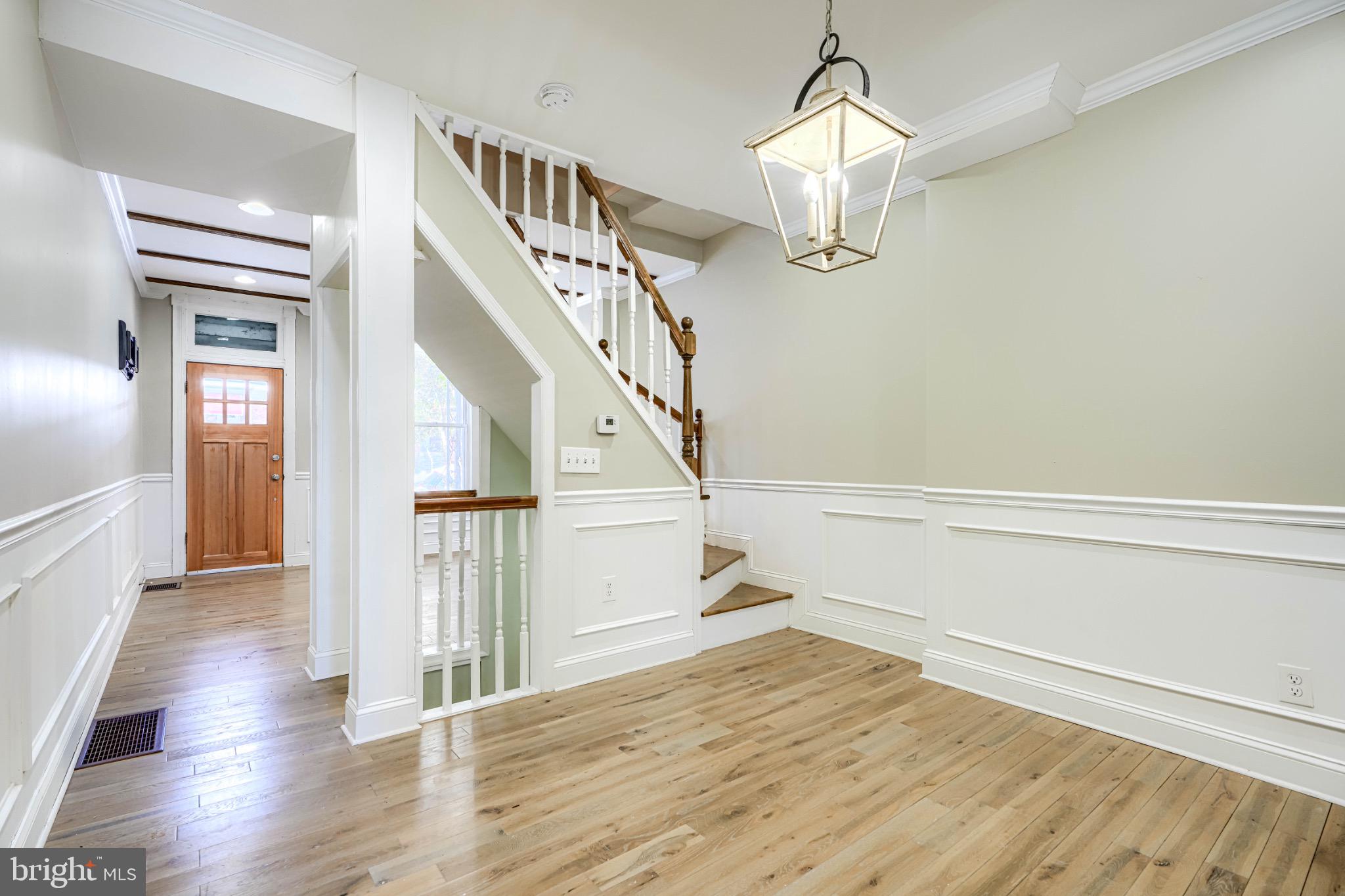 3533 Keswick Road Baltimore, MD 21211 - Photo 8 of 29 Inviting entryway with elegant staircase.
