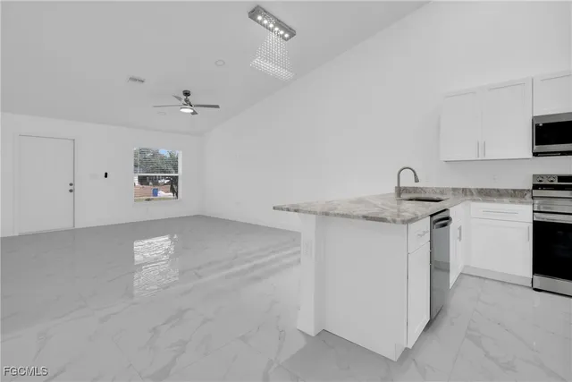 a view of a dining room with furniture