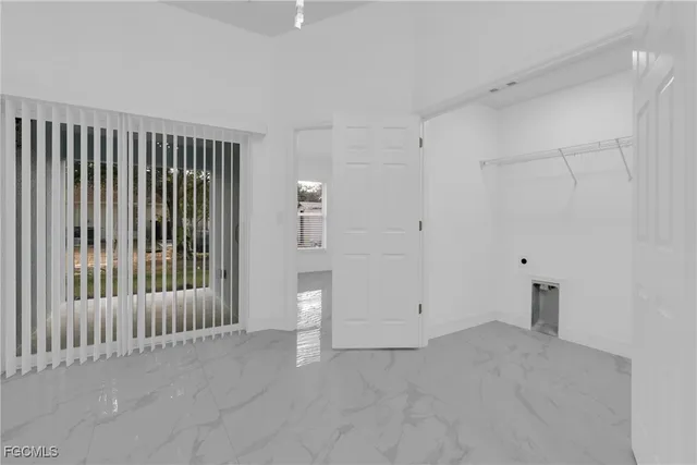 an empty room with windows