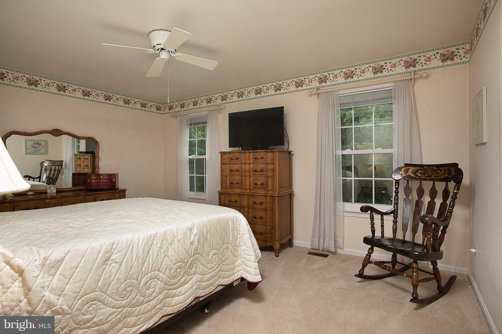 8530 Autumn Rust Road Ellicott City, MD 21043 - Photo 13 of 28 PRIVATE MASTER BEDROOM WITH VIEWS OF WOODS