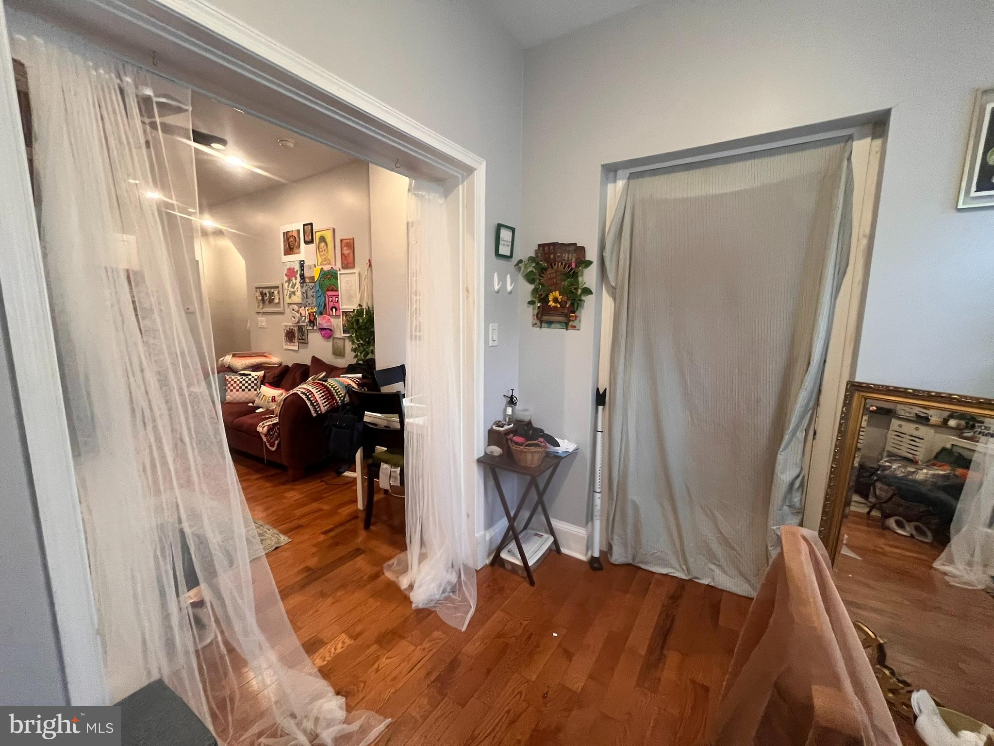 5028 Walnut Street, Unit 1F Philadelphia, PA 19139 - Photo 4 of 32 a bed room with a bed and a couch
