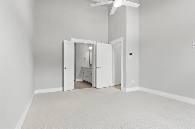 an empty room with a bathroom