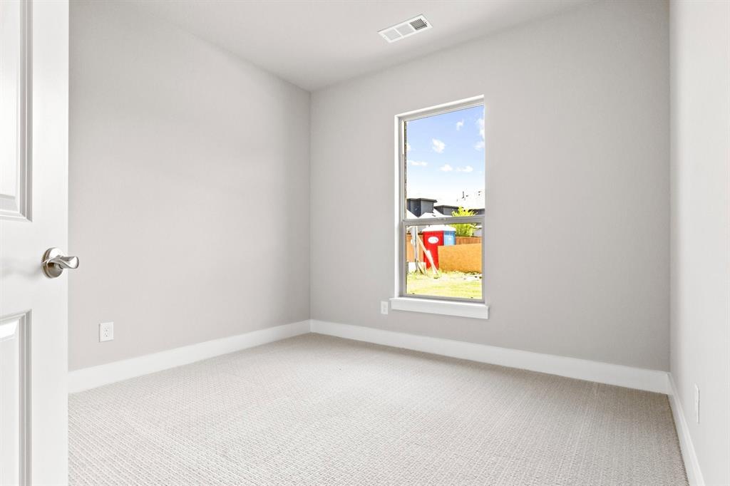8517 Del Rio Trail Wylie, TX 75098 - Photo 23 of 30 an empty room with windows