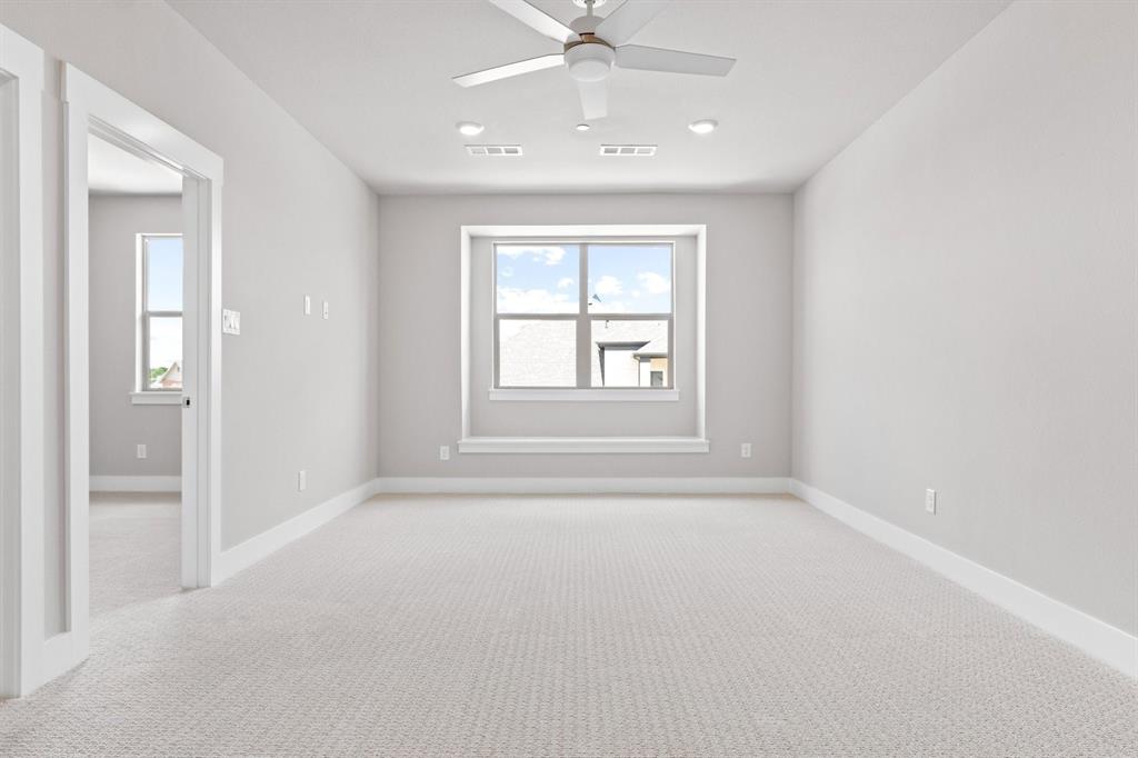 8517 Del Rio Trail Wylie, TX 75098 - Photo 24 of 30 an empty room with windows and closet