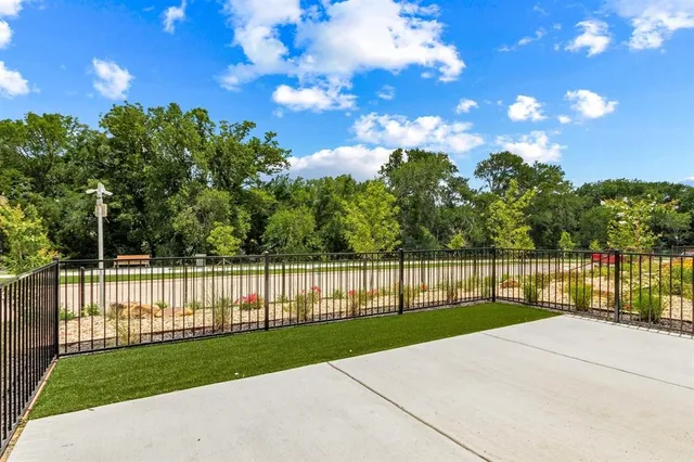 a view of a backyard with a garden