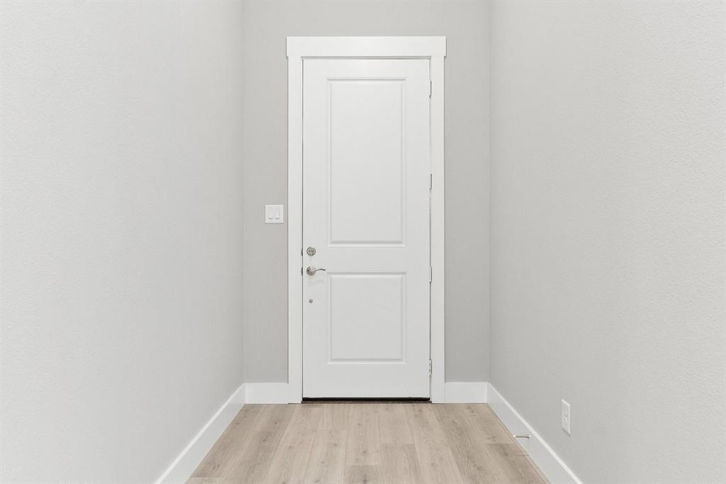 8517 Del Rio Trail Wylie, TX 75098 - Photo 4 of 30 a view of an empty room