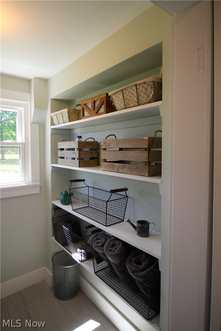 4540 Ridge Road Medina, OH 44256 - Photo 19 of 49 Handy shelf space in first floor laundry room.