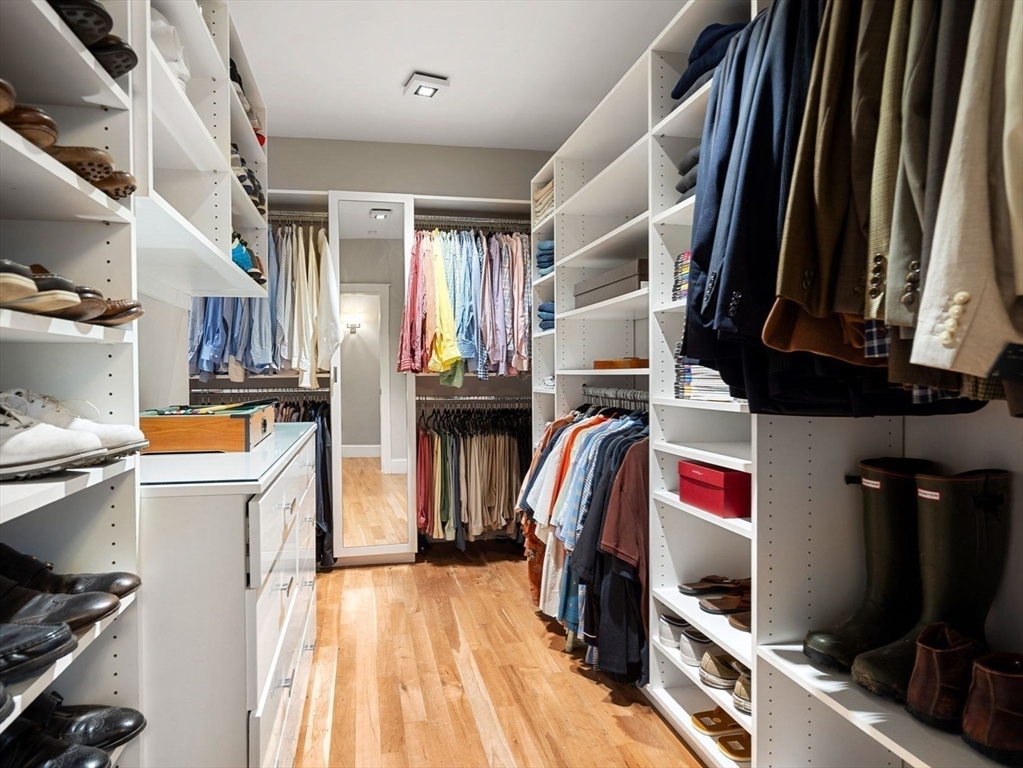 6 Beaver Pond Road Beverly, MA 01915 - Photo 18 of 36 a view of walk in closet with clothes and shoes