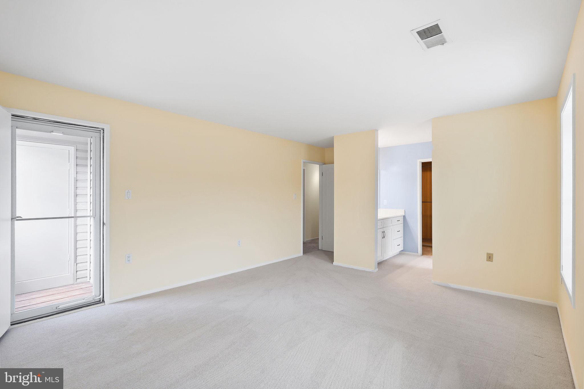 7802 Harrowgate Circle, Unit D Springfield, VA 22152 - Photo 11 of 24 Primary Bedroom
