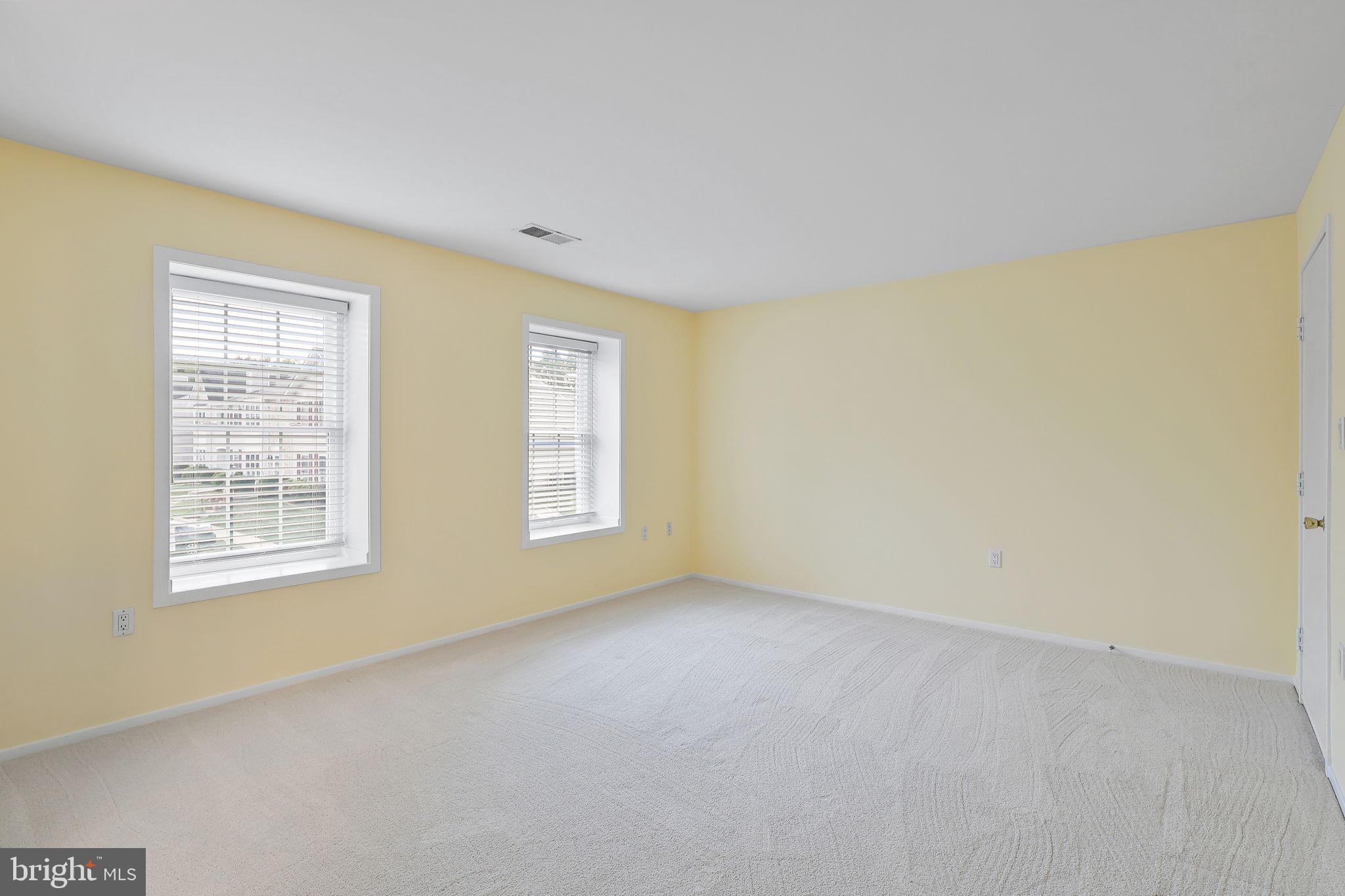 7802 Harrowgate Circle, Unit D Springfield, VA 22152 - Photo 9 of 24 Primary Bedroom