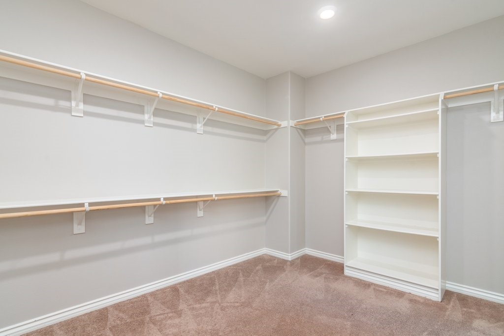 45522 Zander Court Temecula, CA 92592 - Photo 36 of 58 a view of an empty walk in closet